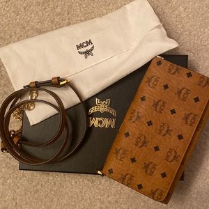 Authentic MCM VISETOS DIAMONDS Prints flap snap wallet /card / phone. Worn twice